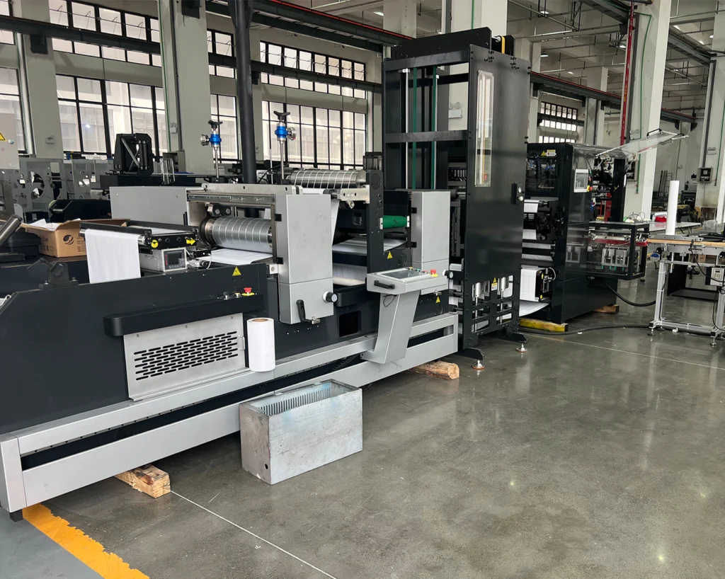 alt="Complete label converting machinery workshop, slitter rewinder, die cutting machine matched with label printing machine"