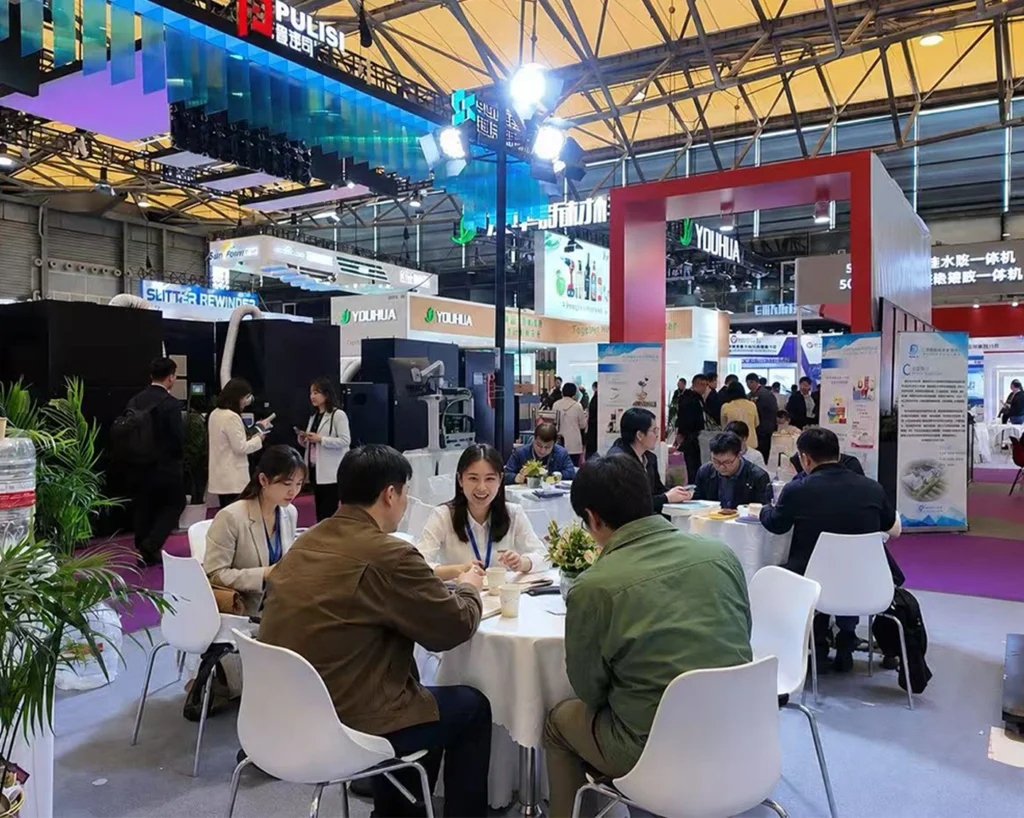 alt="Flexo printing machine exhibition booth display"
