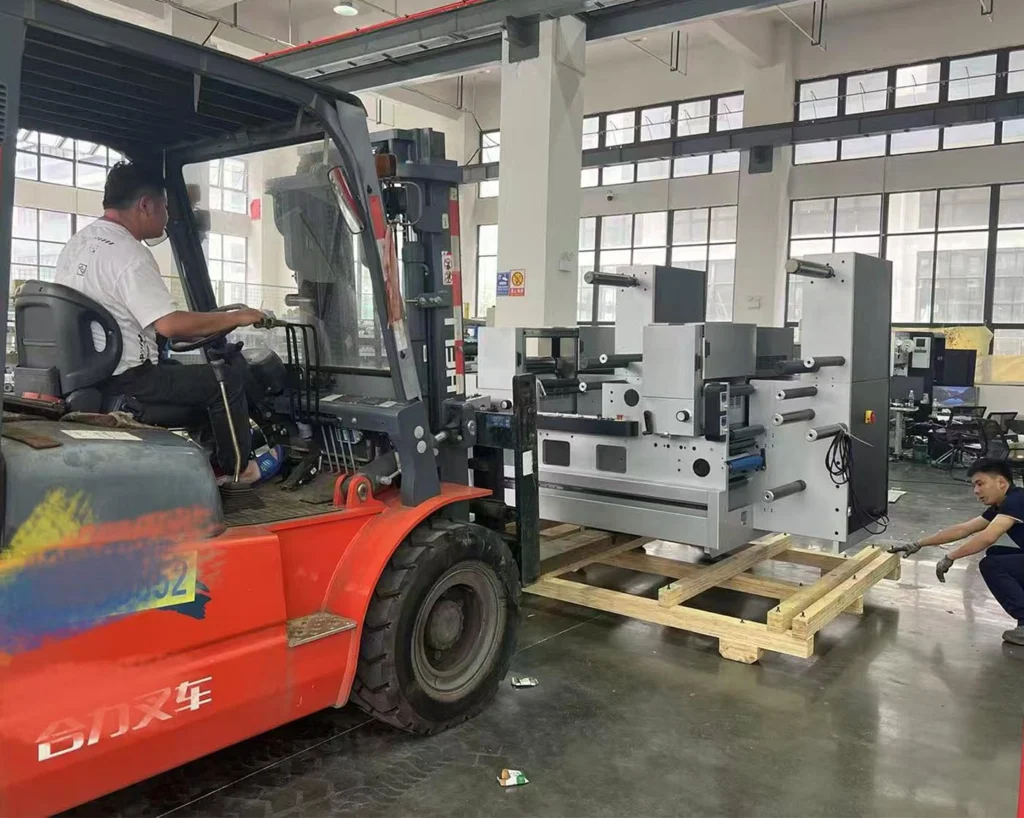alt="Shipping flexographic label printing machine from China factory to overseas label packaging customers"
