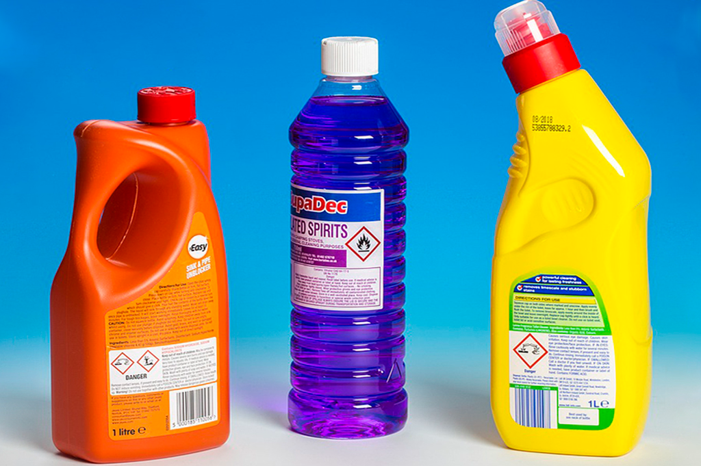 Chemical and industrial product labels on plastic bottles
