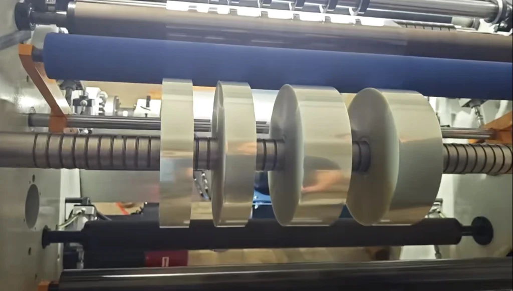 GGIN slitting rewinder machine rewinding multiple slit rolls simultaneously — demonstrating stable tension control and consistent roll alignment during high-speed operation
